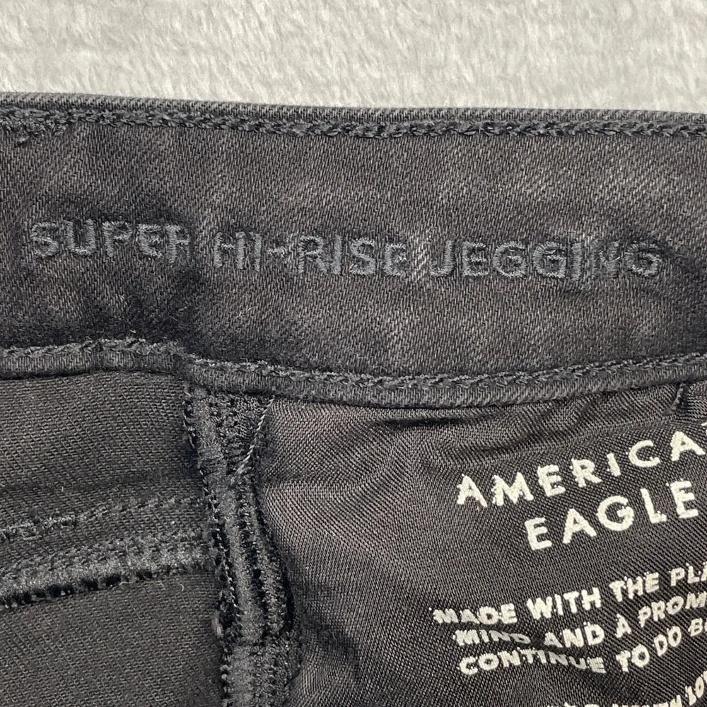 American Eagle Super Hi-Rise Jegging Womens 4 Black Distressed Ripped Next Level